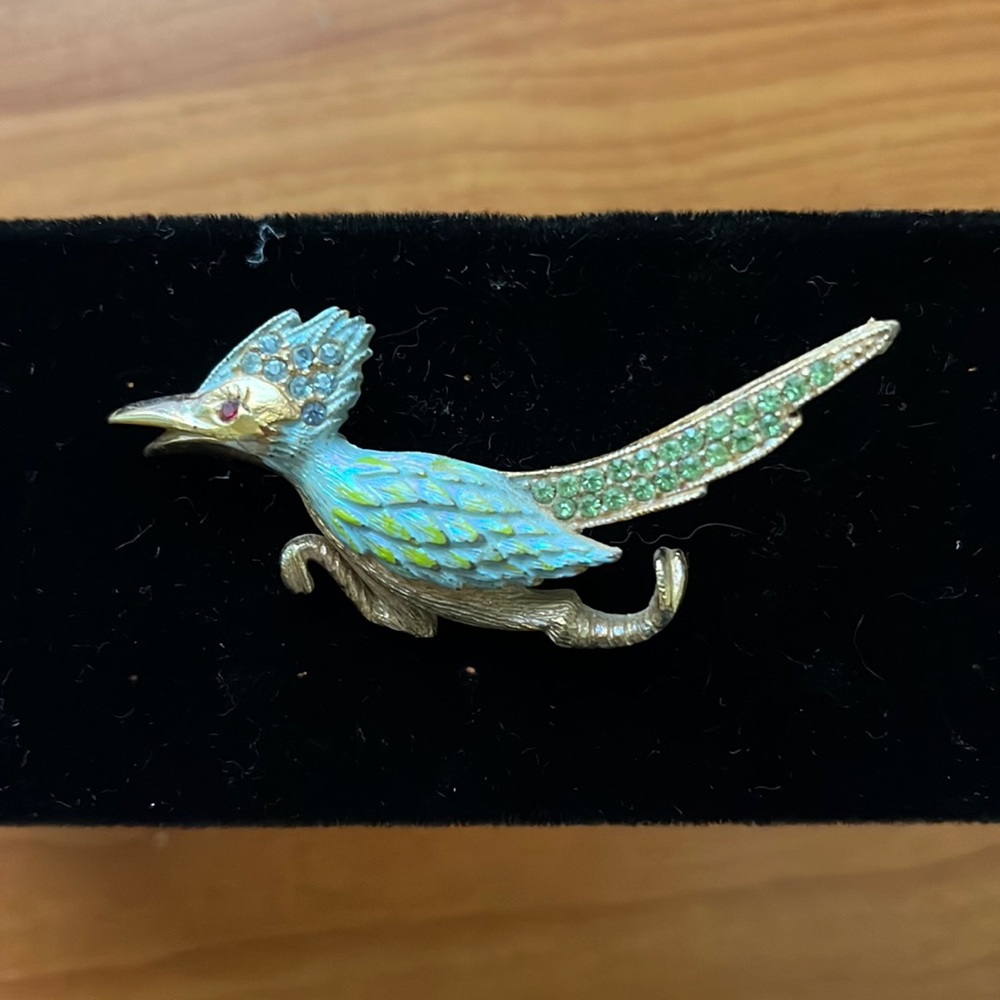 Signed “Ultra” gold tone enamel Roadrunner Brooch with blue/green rhinestones